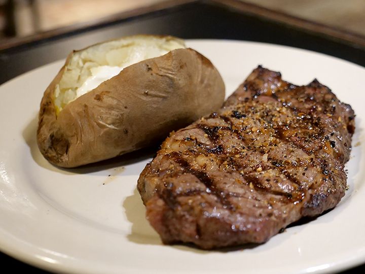 12 Ounce Ribeye With Potato And Salad